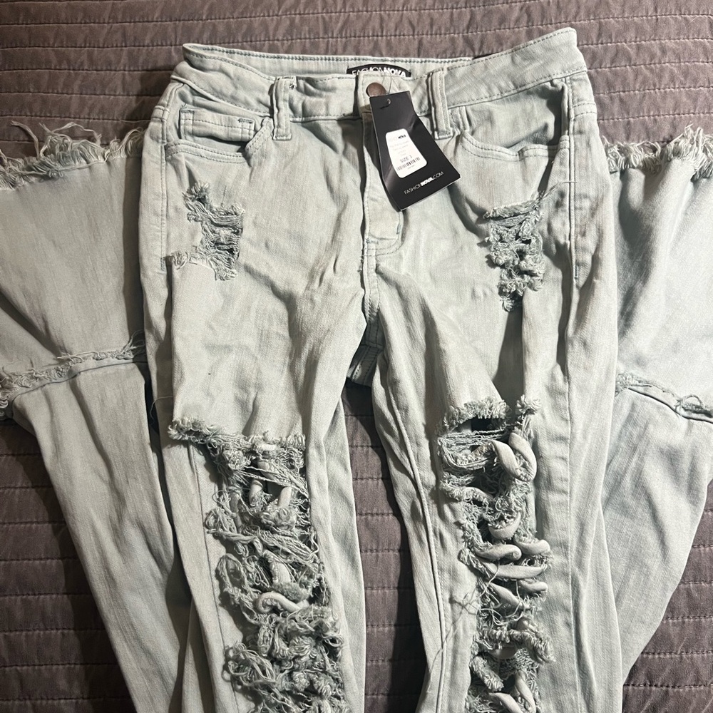 Fashion Nova Ripped Light Gray Skinny Jeans